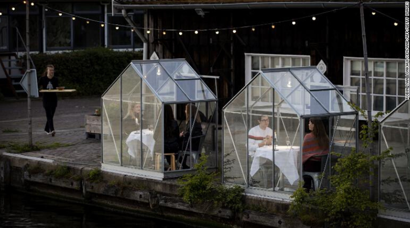 Examples Of Business Model Adjustments In This Economic Shift 2 Mediamatic Eten, A Restaurant In Amsterdam, Is Now Serving Food To Diners While They Sit In Quarantine Greenhouses.